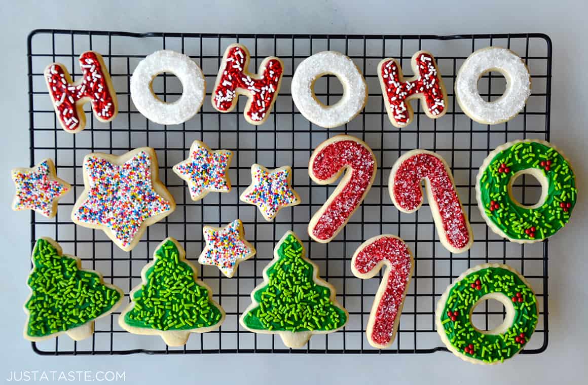 An assortment of Christmas cookies decorated with frosting and sprinkles
