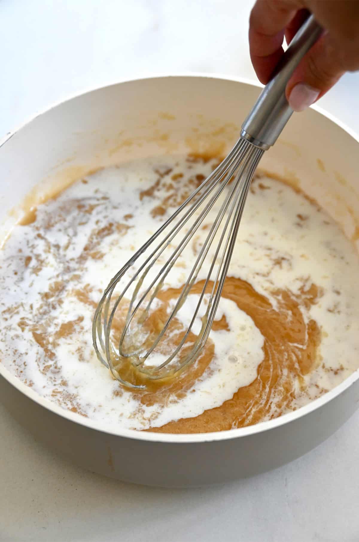 Garlic bechamel in a Dutch oven.