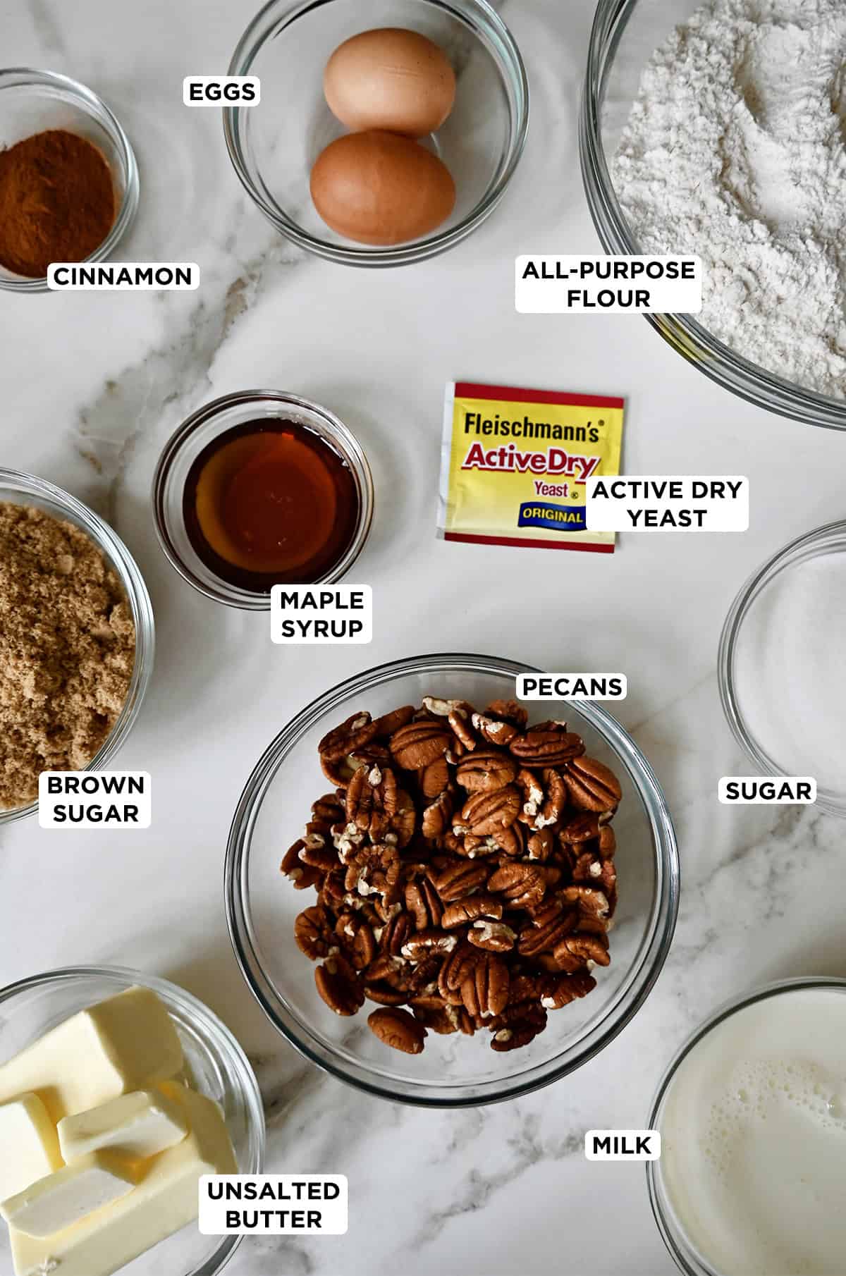 Ingredients to make maple pecan sticky buns from scratch.