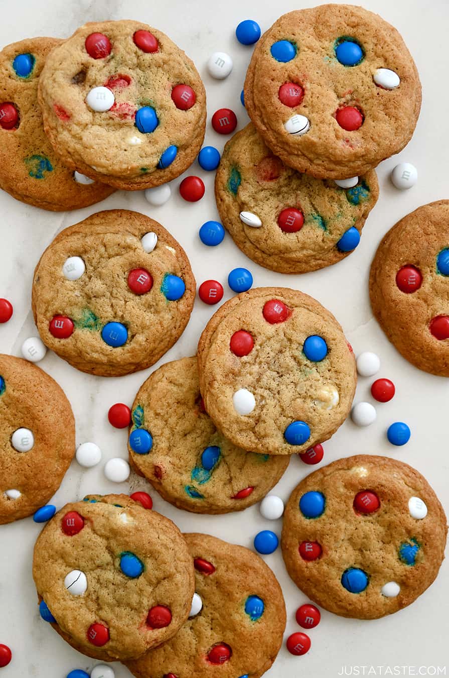 A top-down view of 4th of July M&M cookies studded with red, white and blue M&Ms