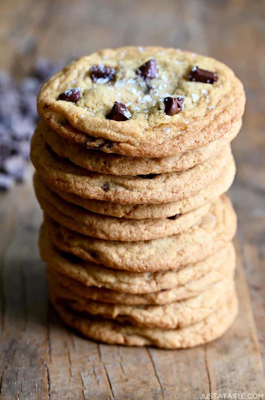 A tall stack of easy No-Chill Chocolate Chip Cookies topped with sea salt