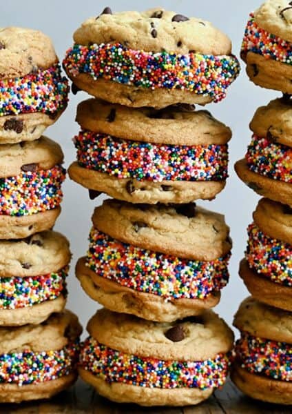 Three rows of stacked cookie ice cream sandwiches.