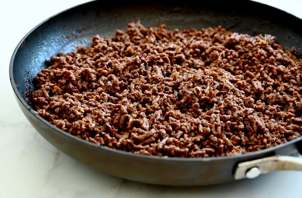Cooked ground beef in a nonstick skillet