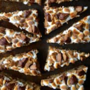 A top-down view of peanut butter s'mores bars cut into triangles.