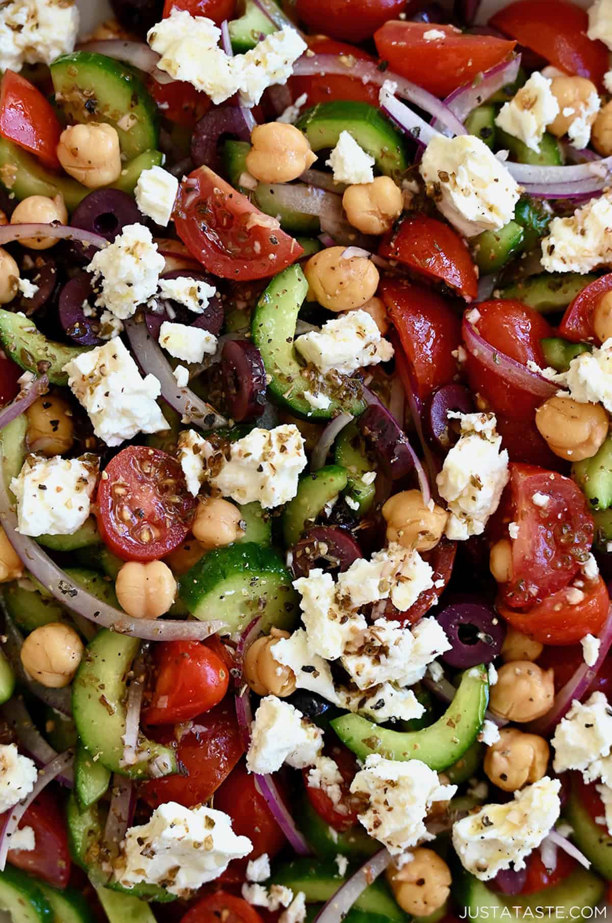 A close-up view of a Mediterranean-inspired salad with feta cheese.