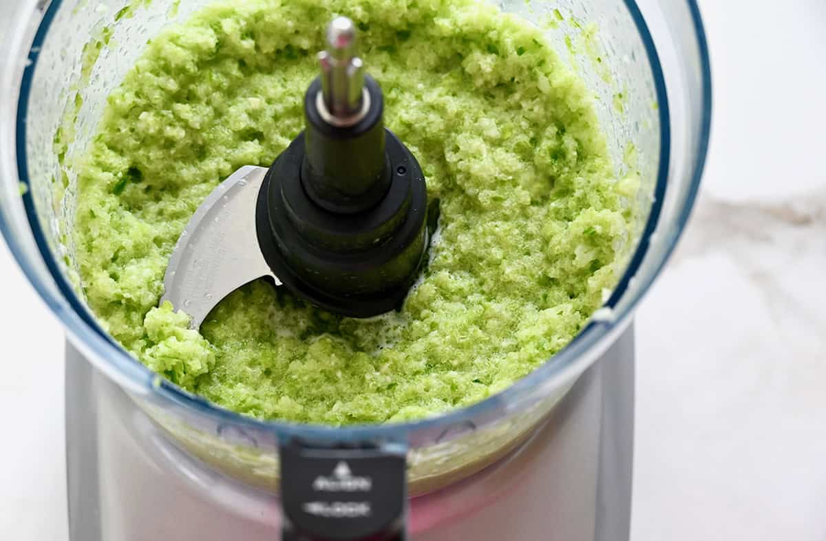 Sofrito (pureed onion, green pepper and garlic) in a food processor.