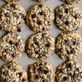 A top-down view of oatmeal zucchini cookies studded with chocolate chips.