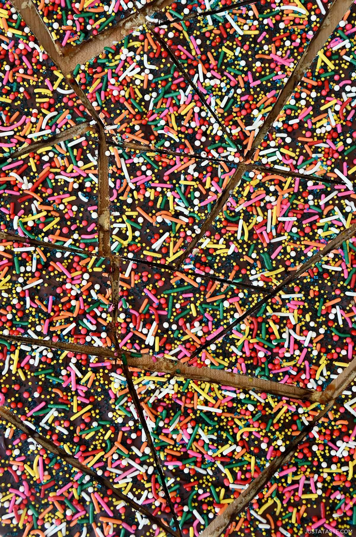 Oyster cracker toffee bark topped with vibrant sprinkles.