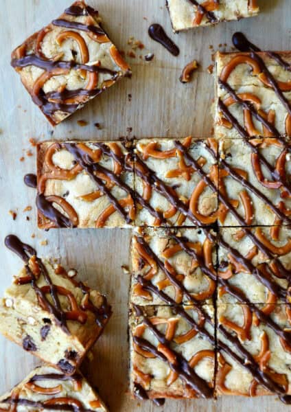 Pretzel chocolate chip cookie bars drizzled with melted chocolate and cut into squares.