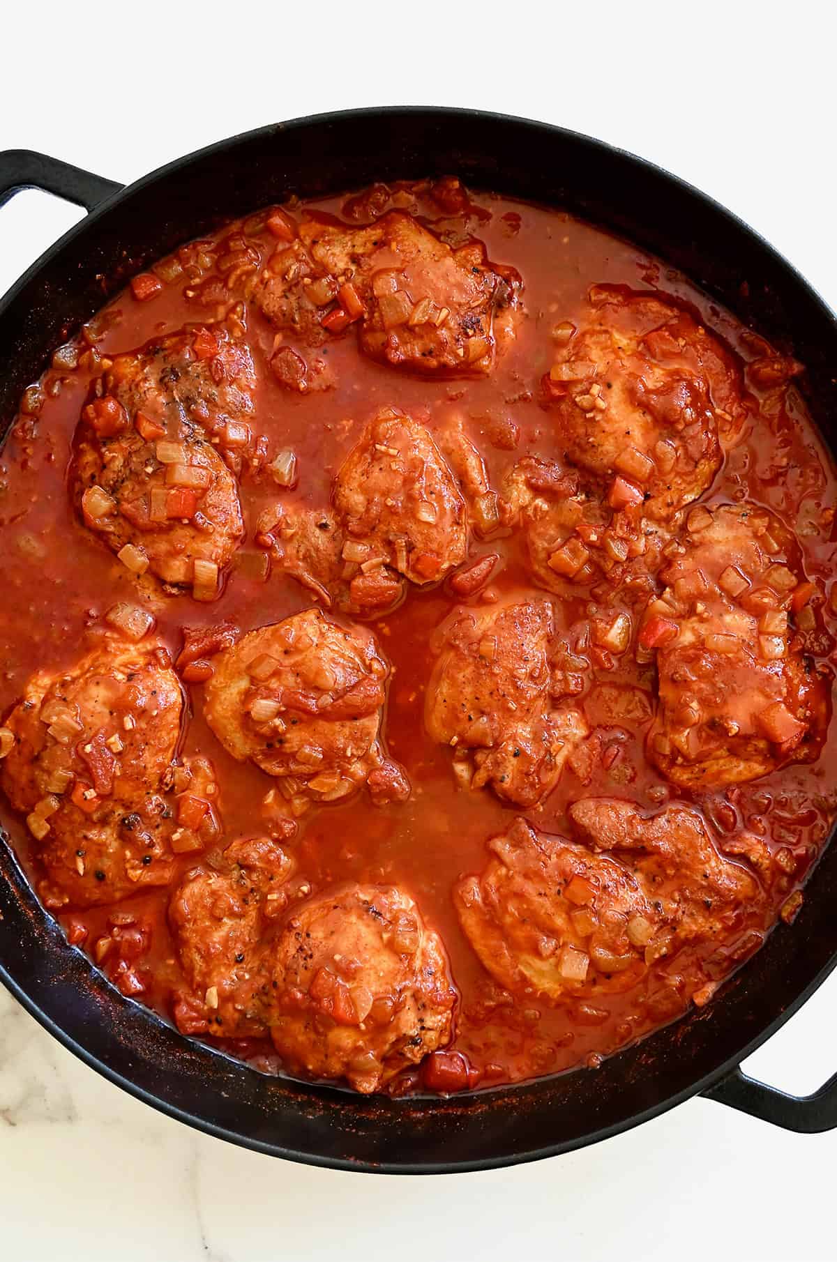 Paprika chicken in a skillet.