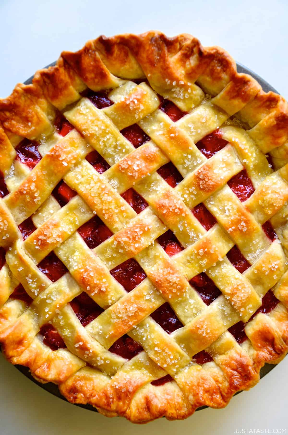 A golden brown, buttery flaky pie crust with a lattice topping.