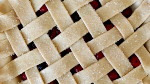 Woven lattice pie crust before baking.