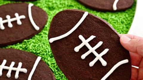 Chocolate football cookies with royal icing laces.