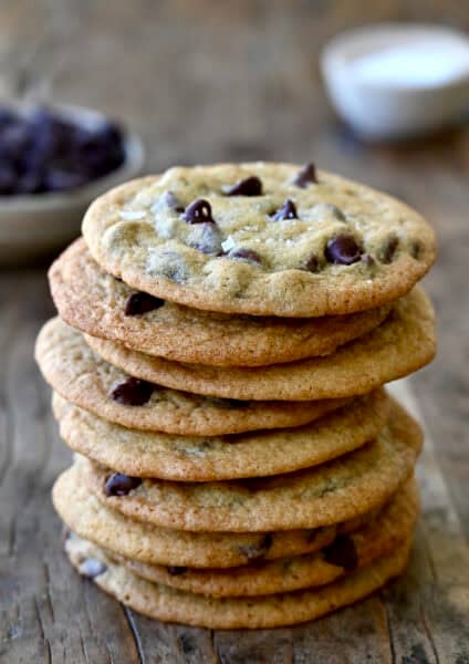 A tall stack of Toll House chocolate chip cookies.