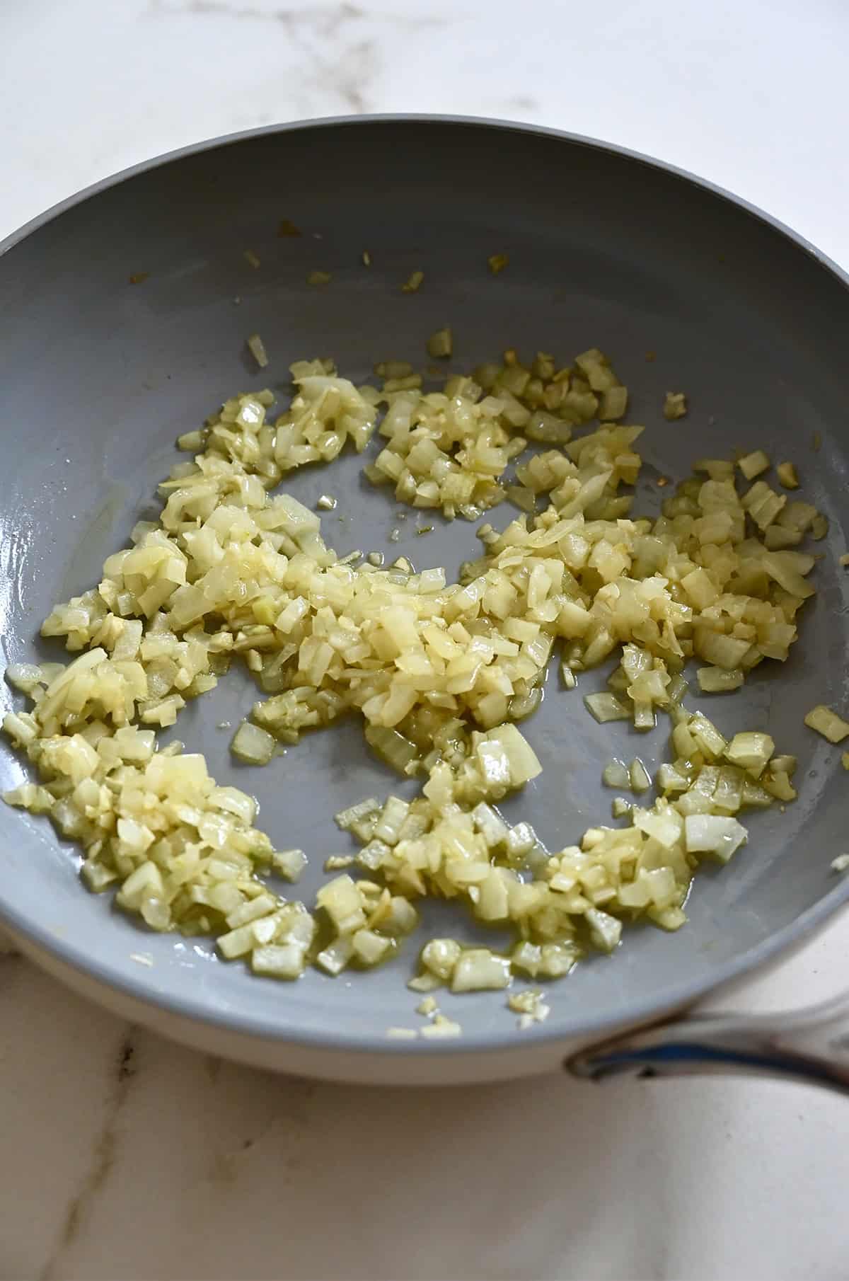 Sautéed onions and garlic in a nonstick skillet.