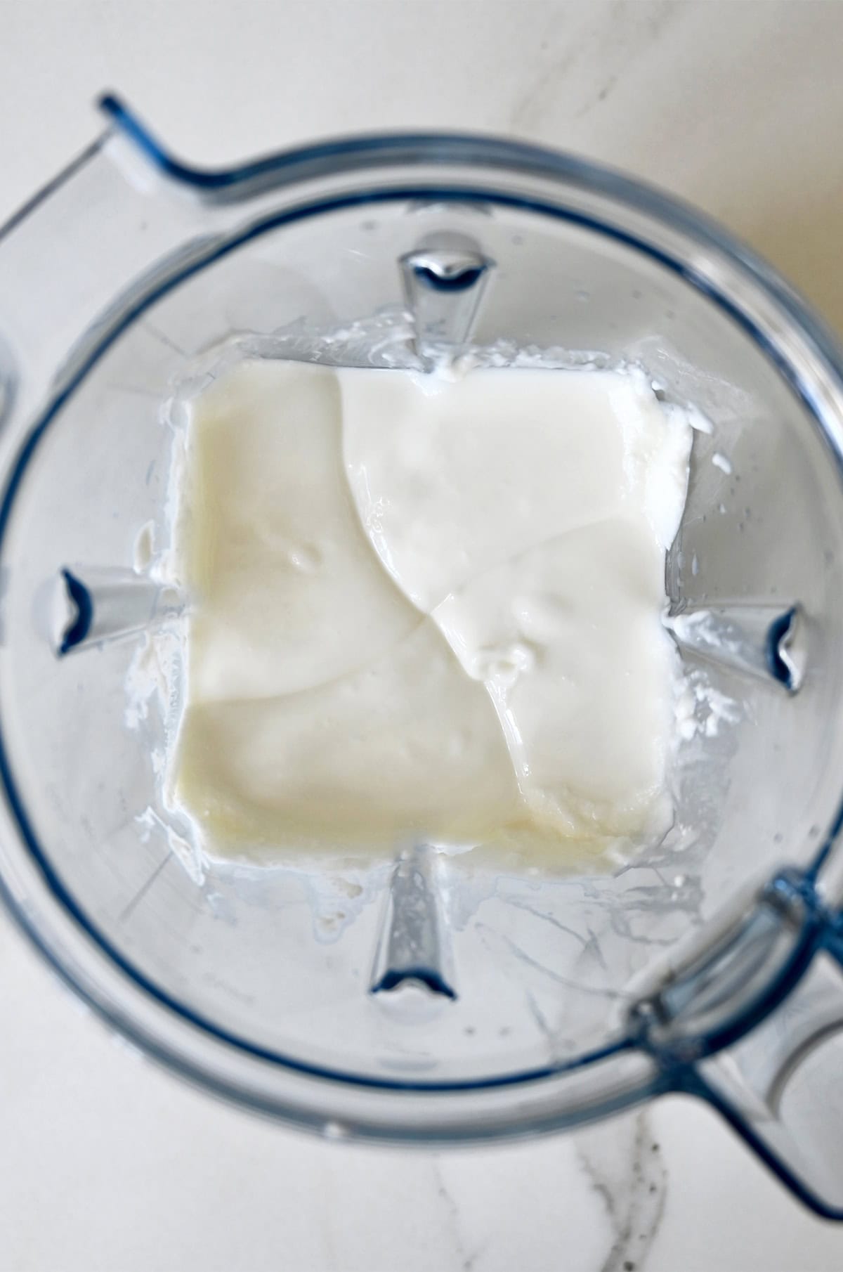 Silky smooth cottage cheese in a blender.