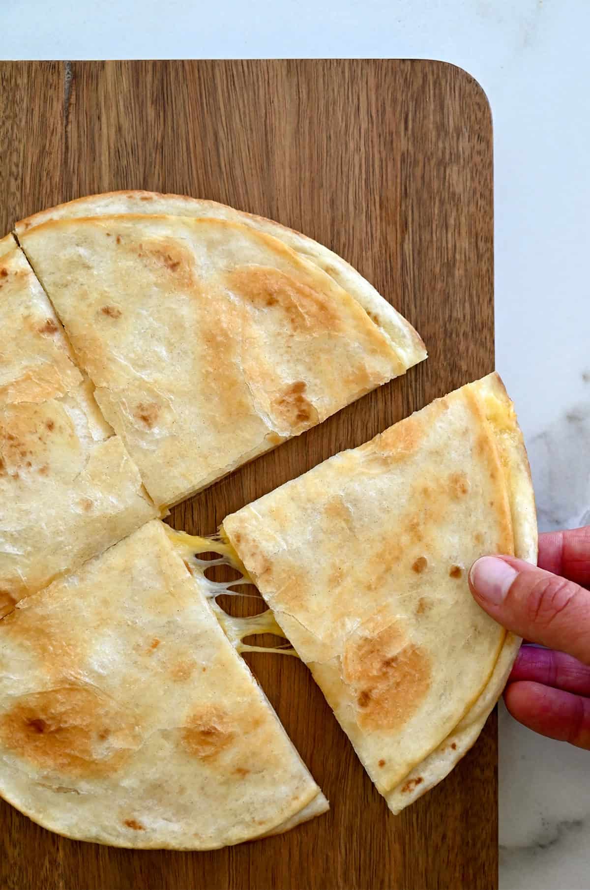 Cheese pull, quesadilla style.