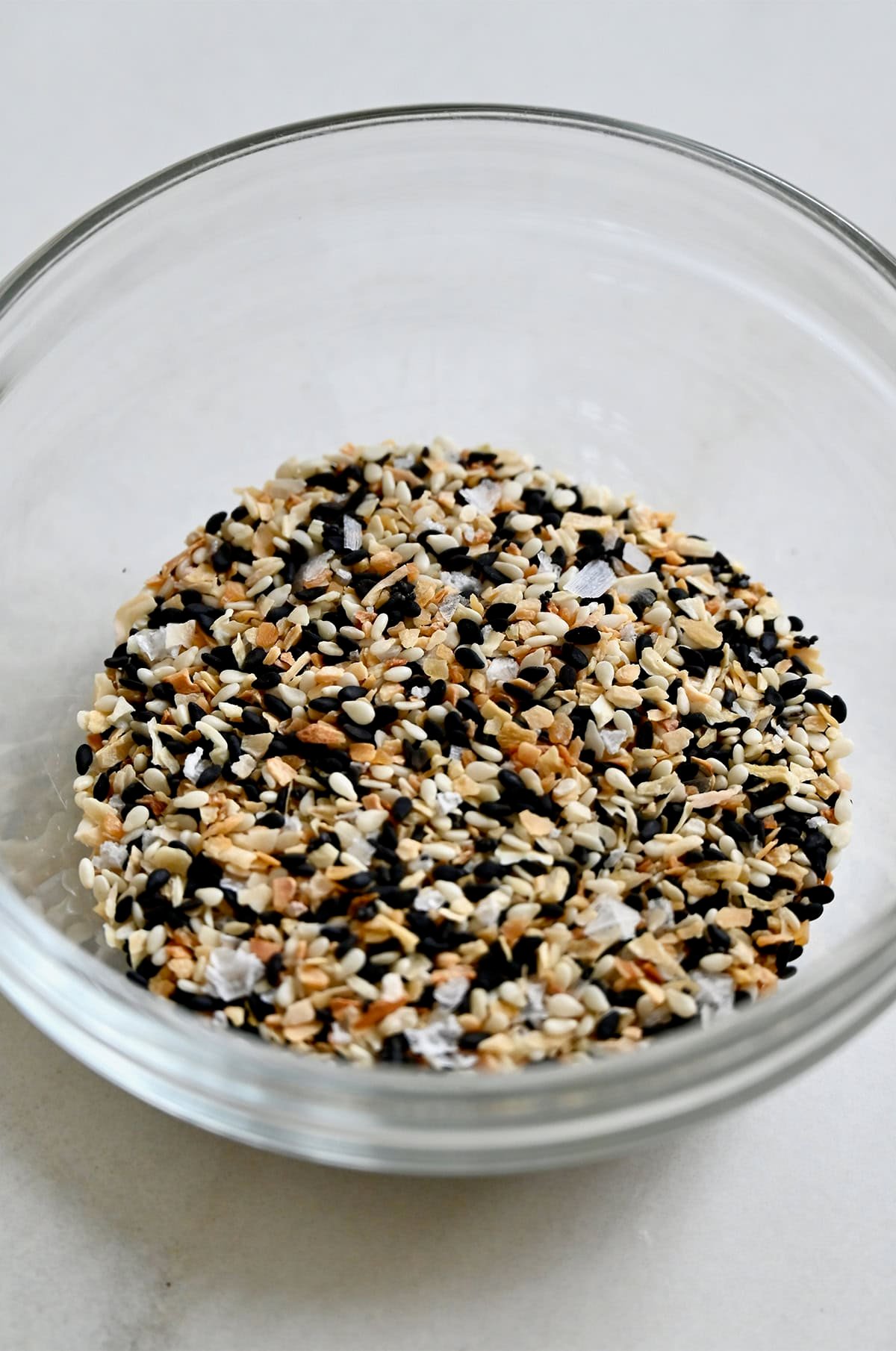 DIY everything seasoning blend in a glass bowl.