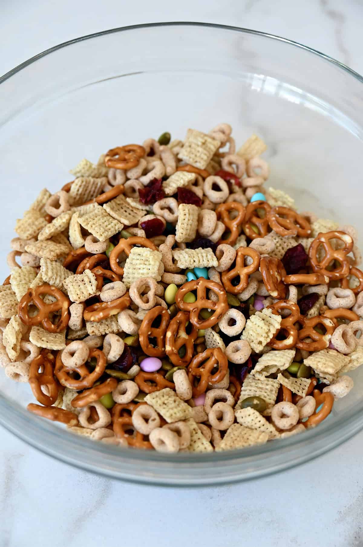 Homemade trail mix without nuts in a glass bowl.