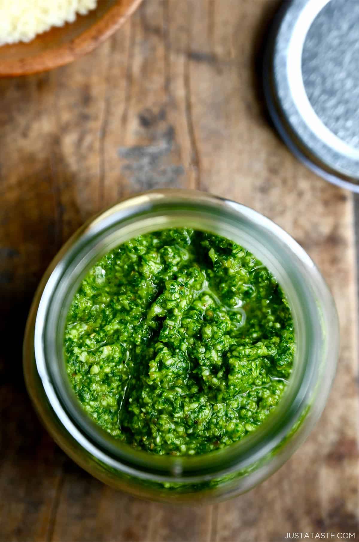Homemade basil pesto in a jar.