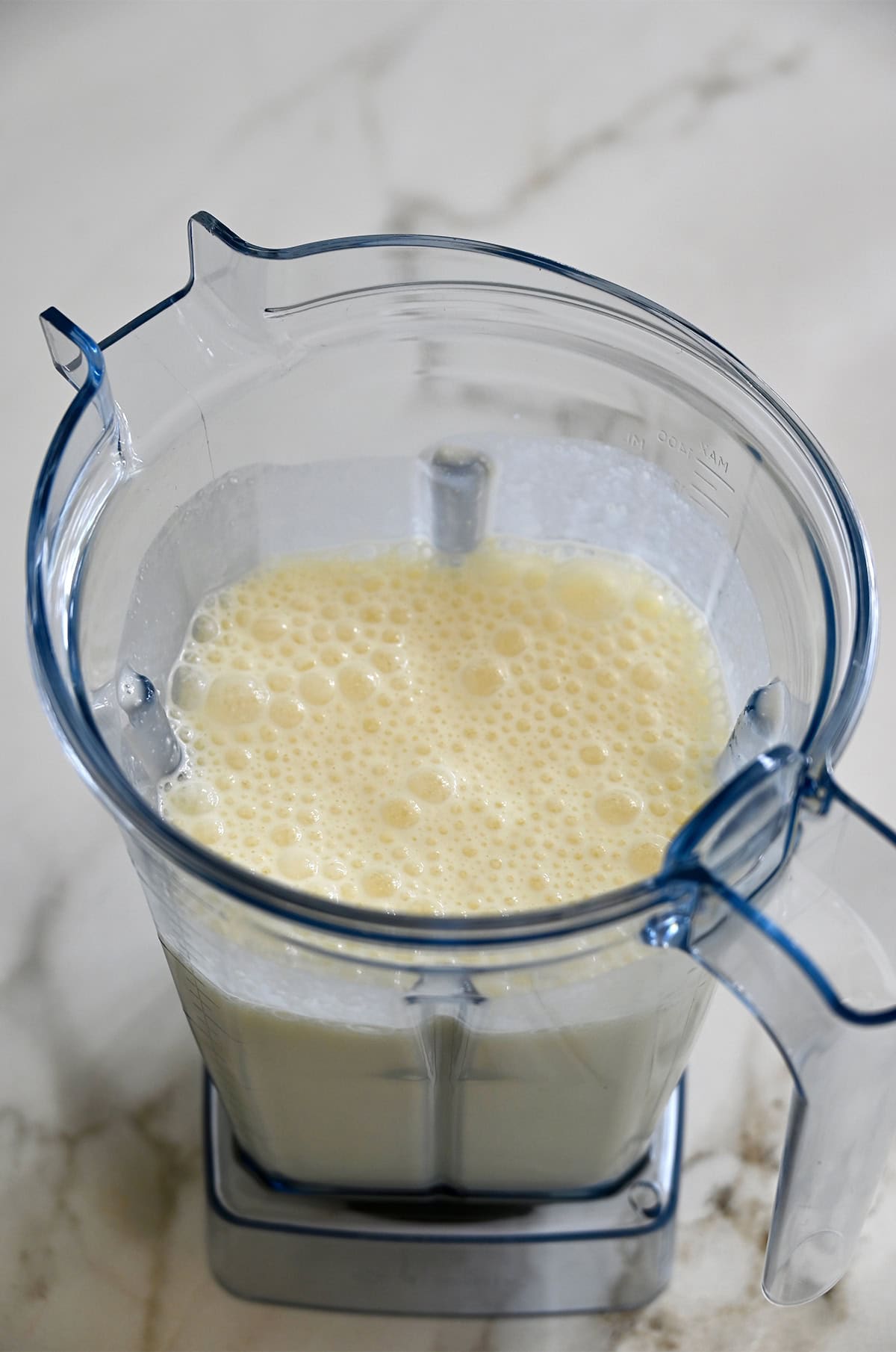 Blended cottage cheese waffle ingredients in a high-powered blender.