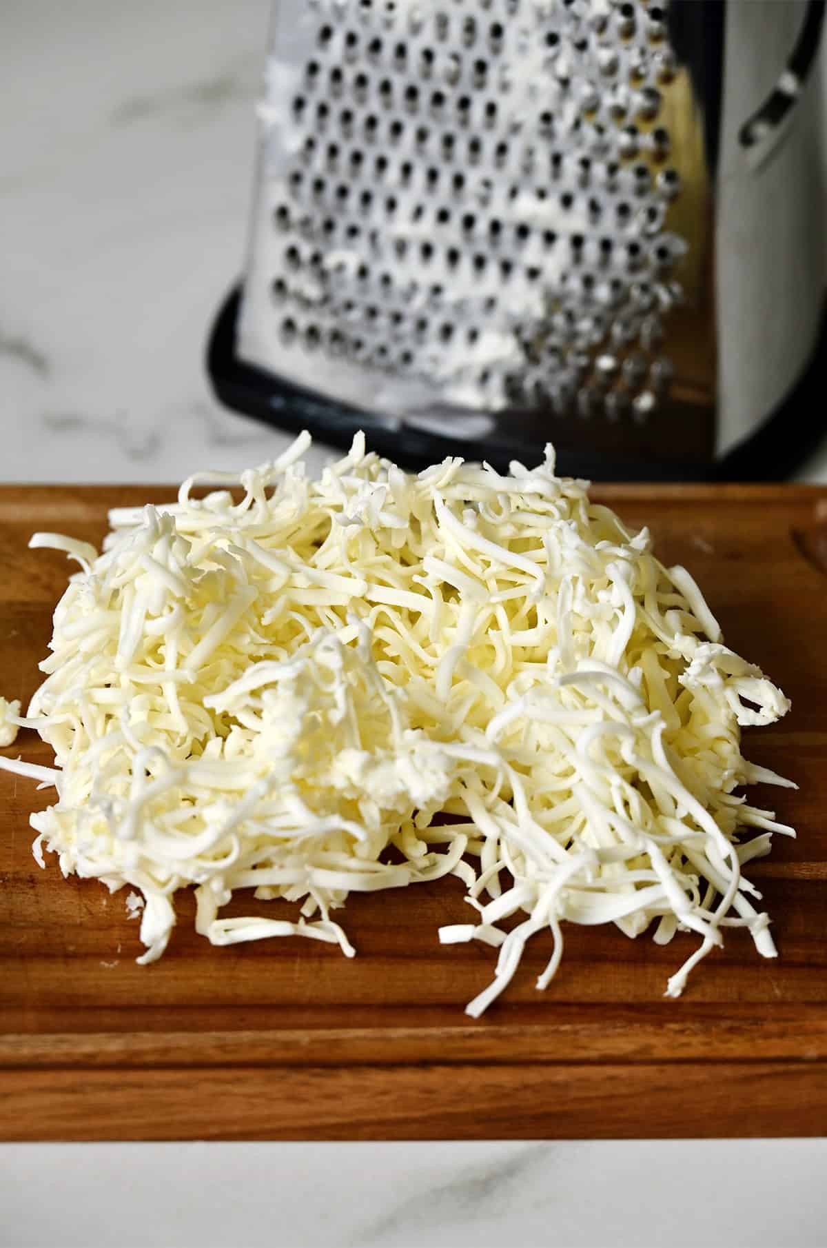 Grated butter on a cutting board. 
