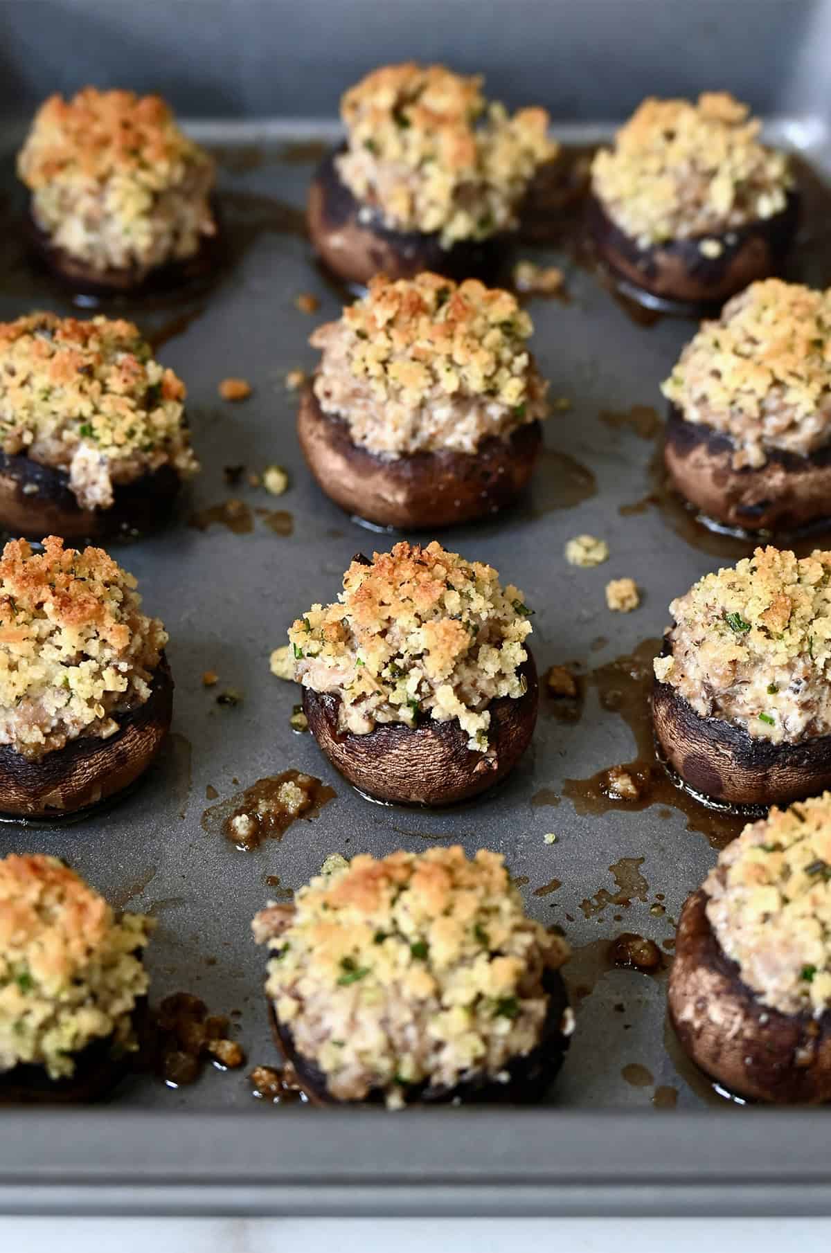 Baked stuffed mushrooms with a crispy bread topping.