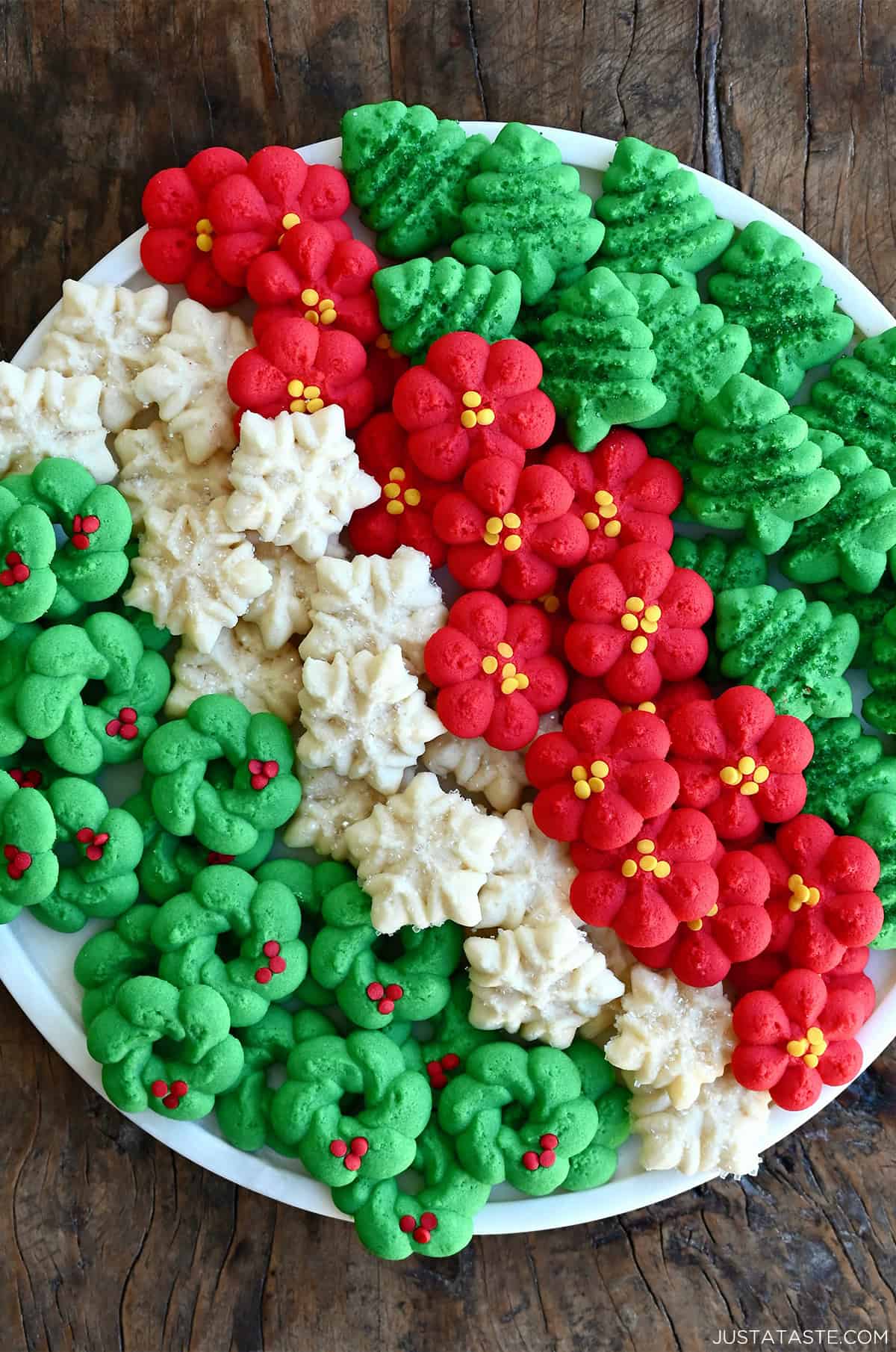 Buttery spritz cookies on a serving tray.