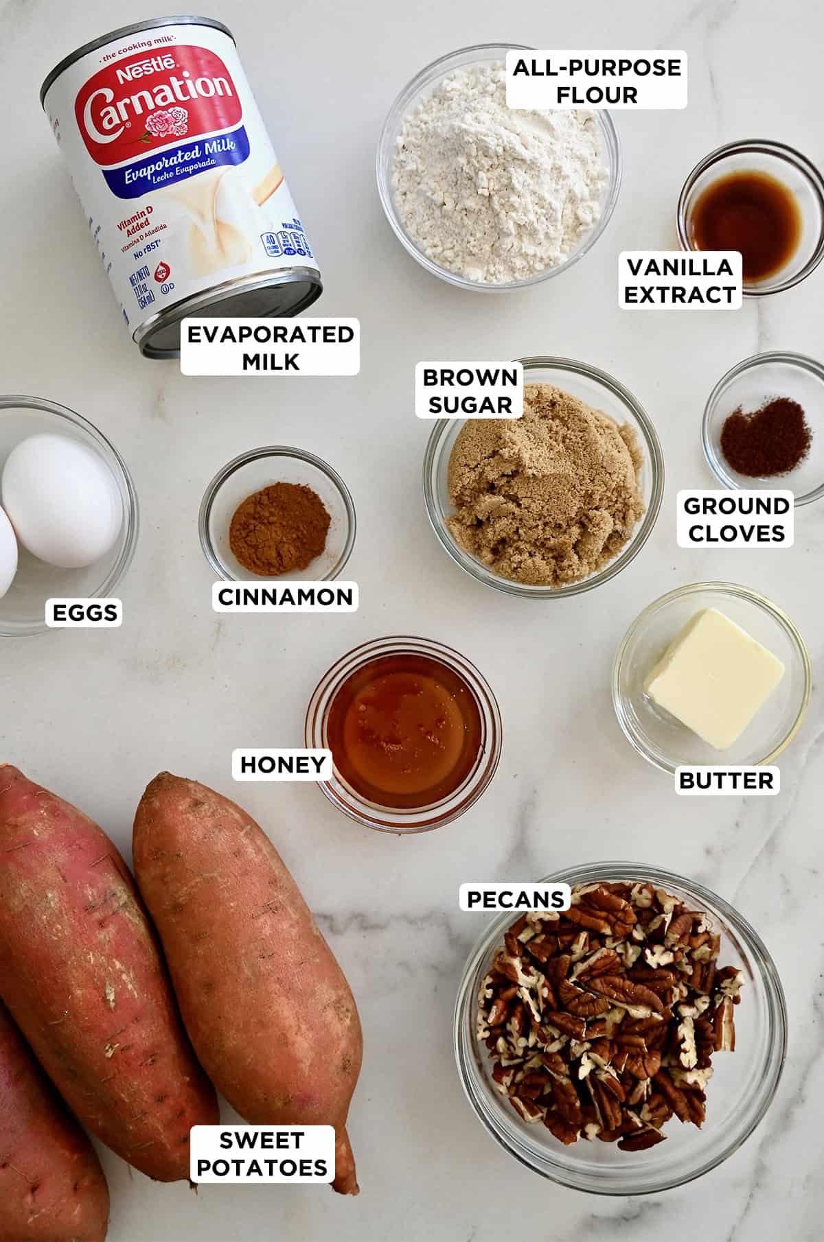 Ingredients to make sweet potato casserole with a pecan crumble topping.