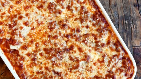 Cottage cheese lasagna with a golden brown cheesy crust in a baking dish.