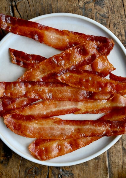 A plate full of oven-baked bacon.