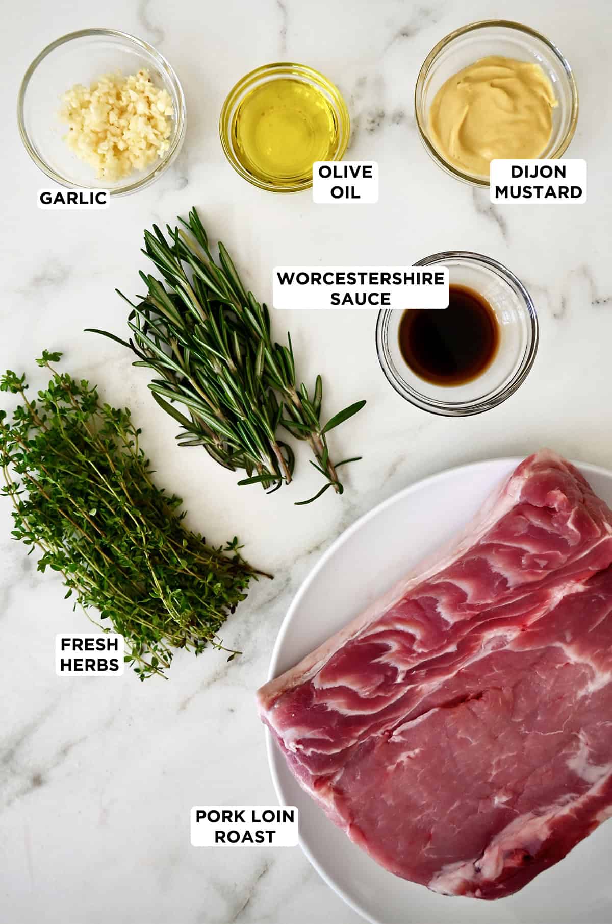 Ingredients to make an herb-crusted pork loin roast.