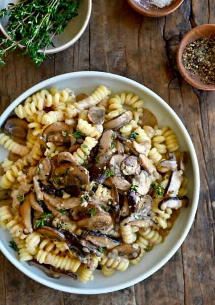 Creamy mushroom pasta on a dinner plate.
