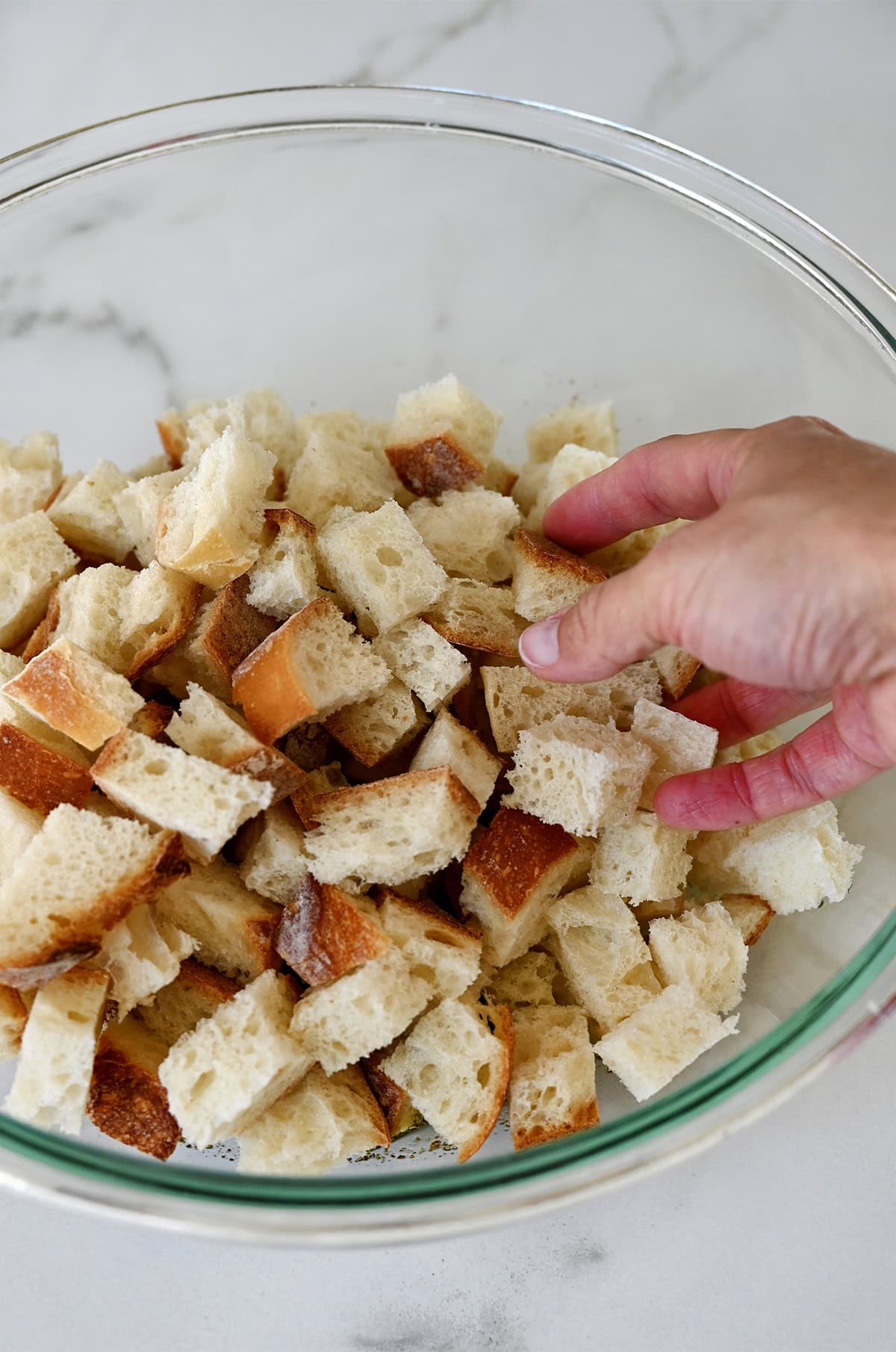 Cubed bread pieces in a large bowl.