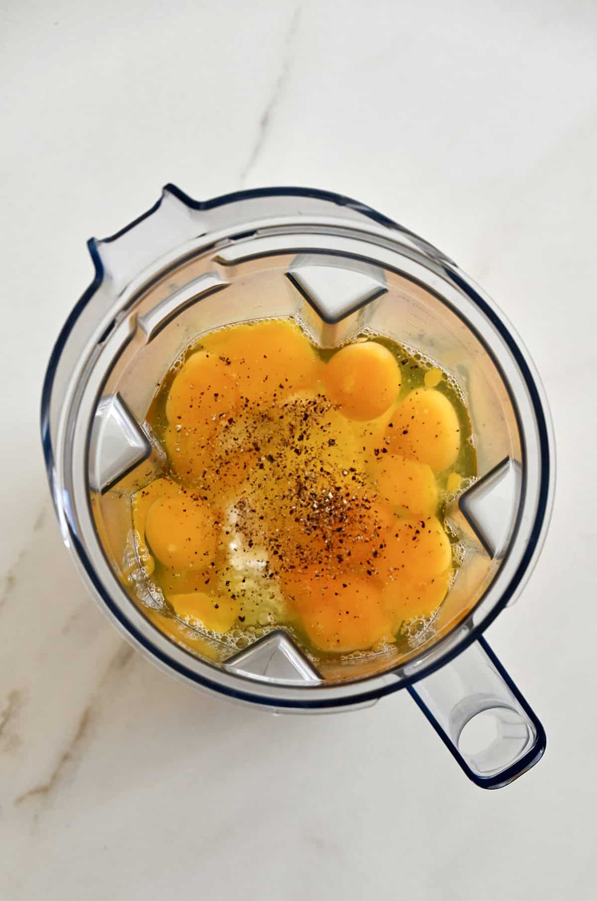 Eggs and cottage cheese in a blender with salt and pepper.