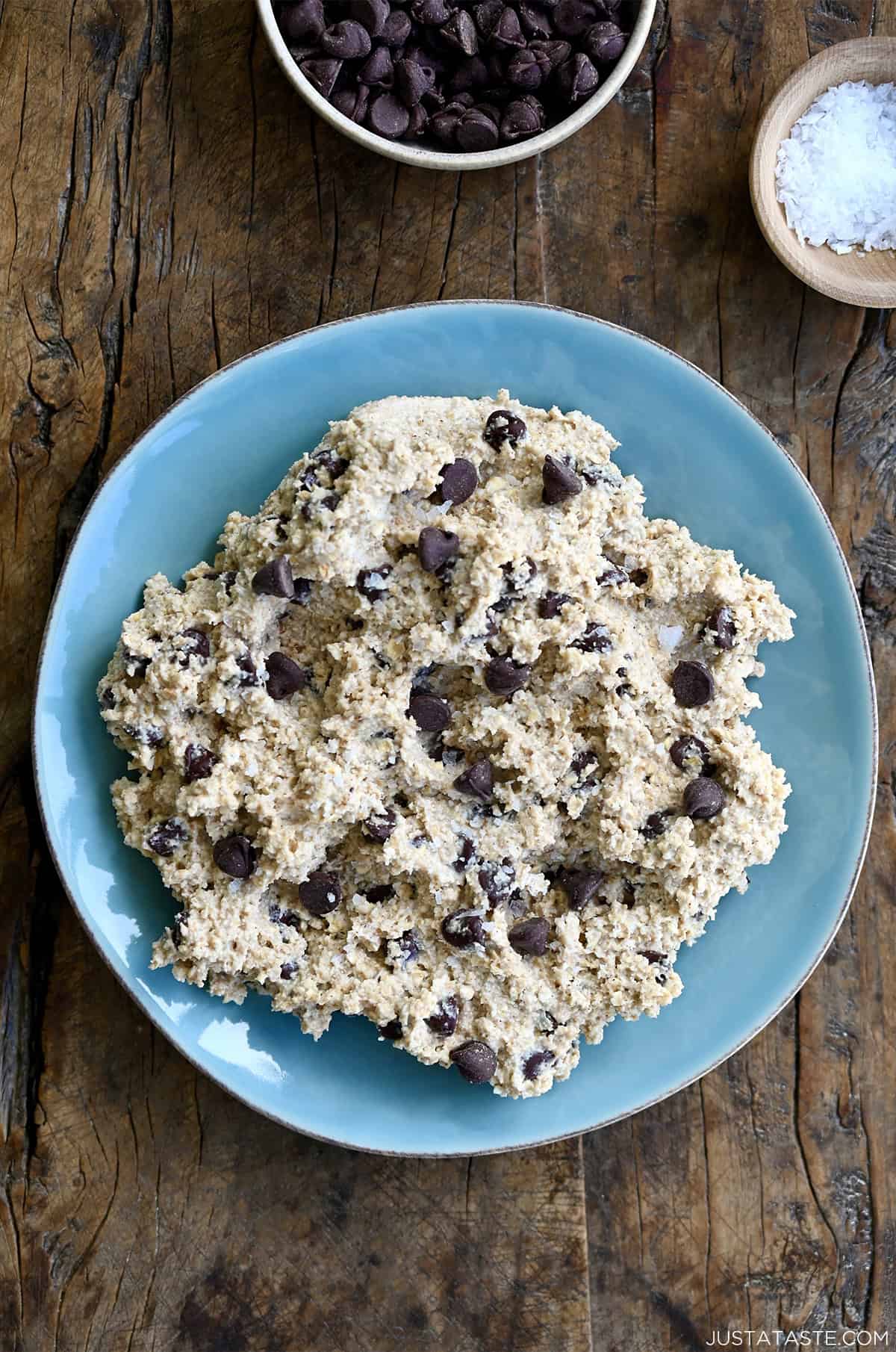 Chocolate chip cottage cheese cookie dough in a blue bowl.