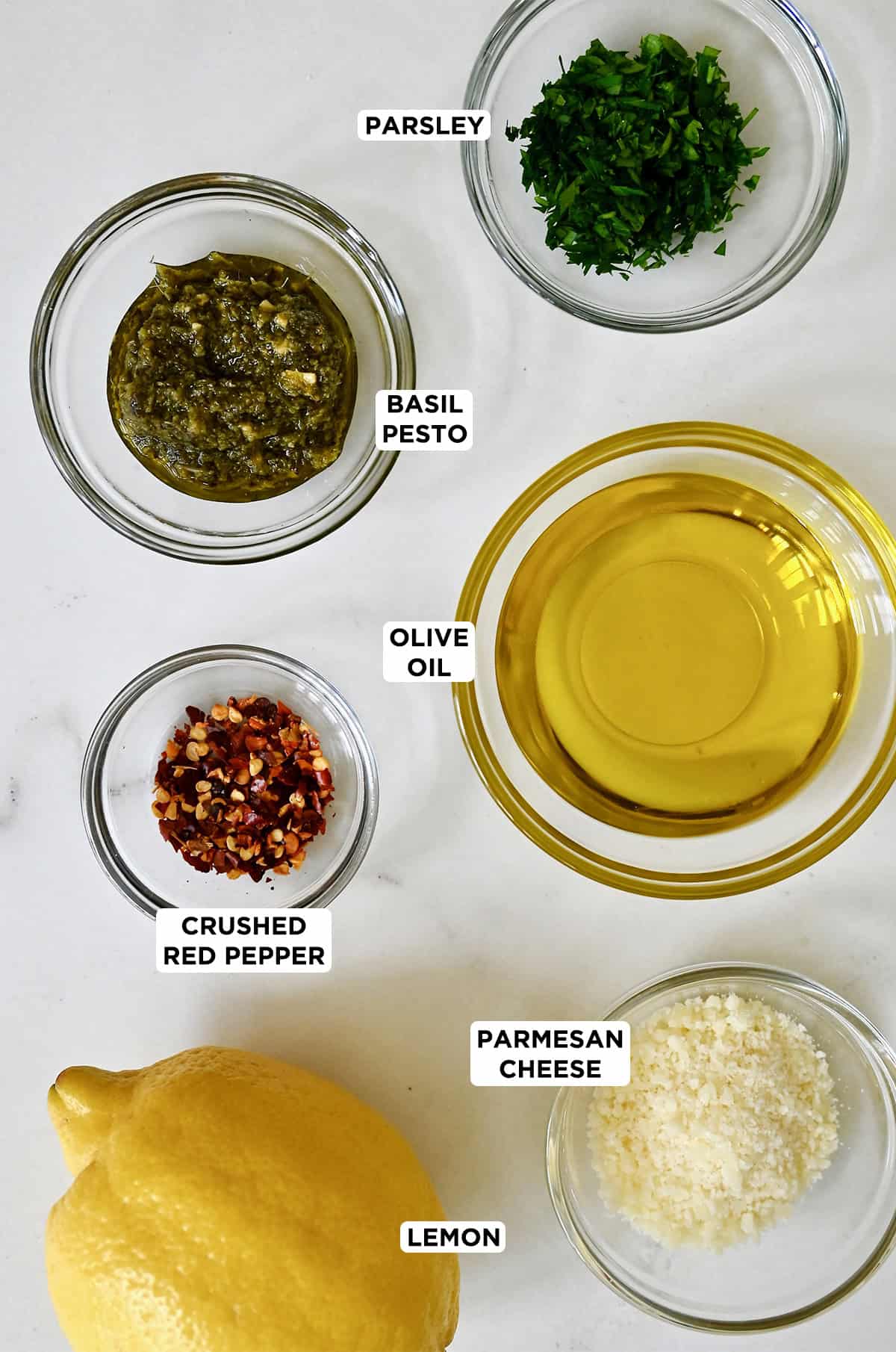 Ingredients to make bread dipping oil with pesto.