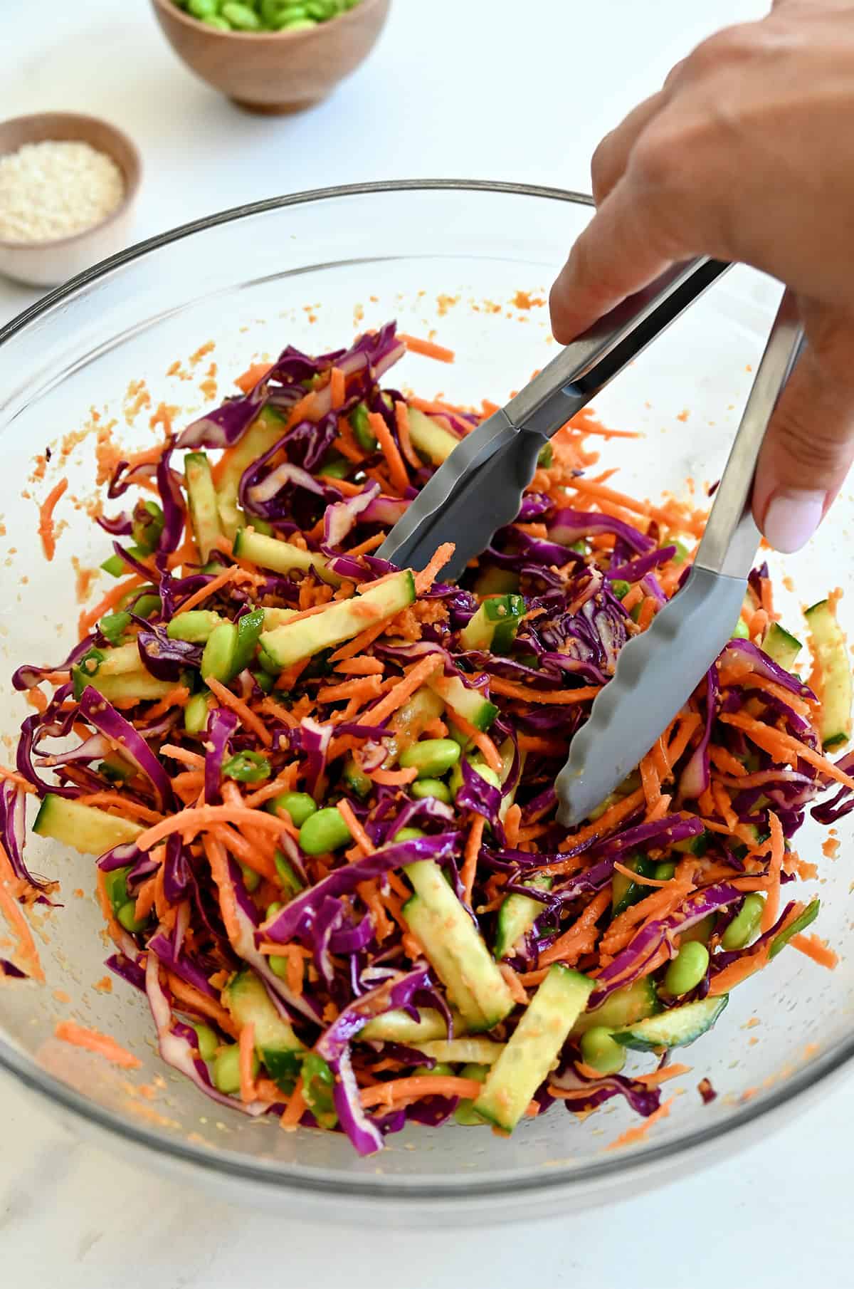 Tossing carrot-ginger dressing with crunchy veggies to make an Asian-inspired salad.