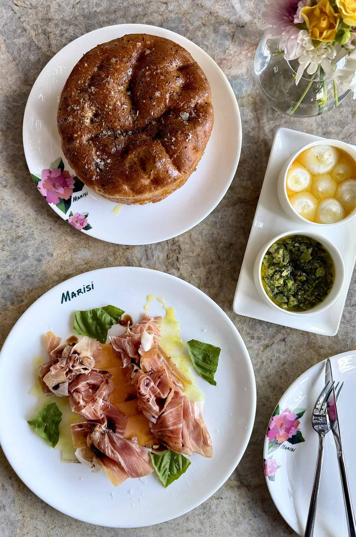 Appetizer plates on a table at the Marisi restaurant in La Jolla, CA.
