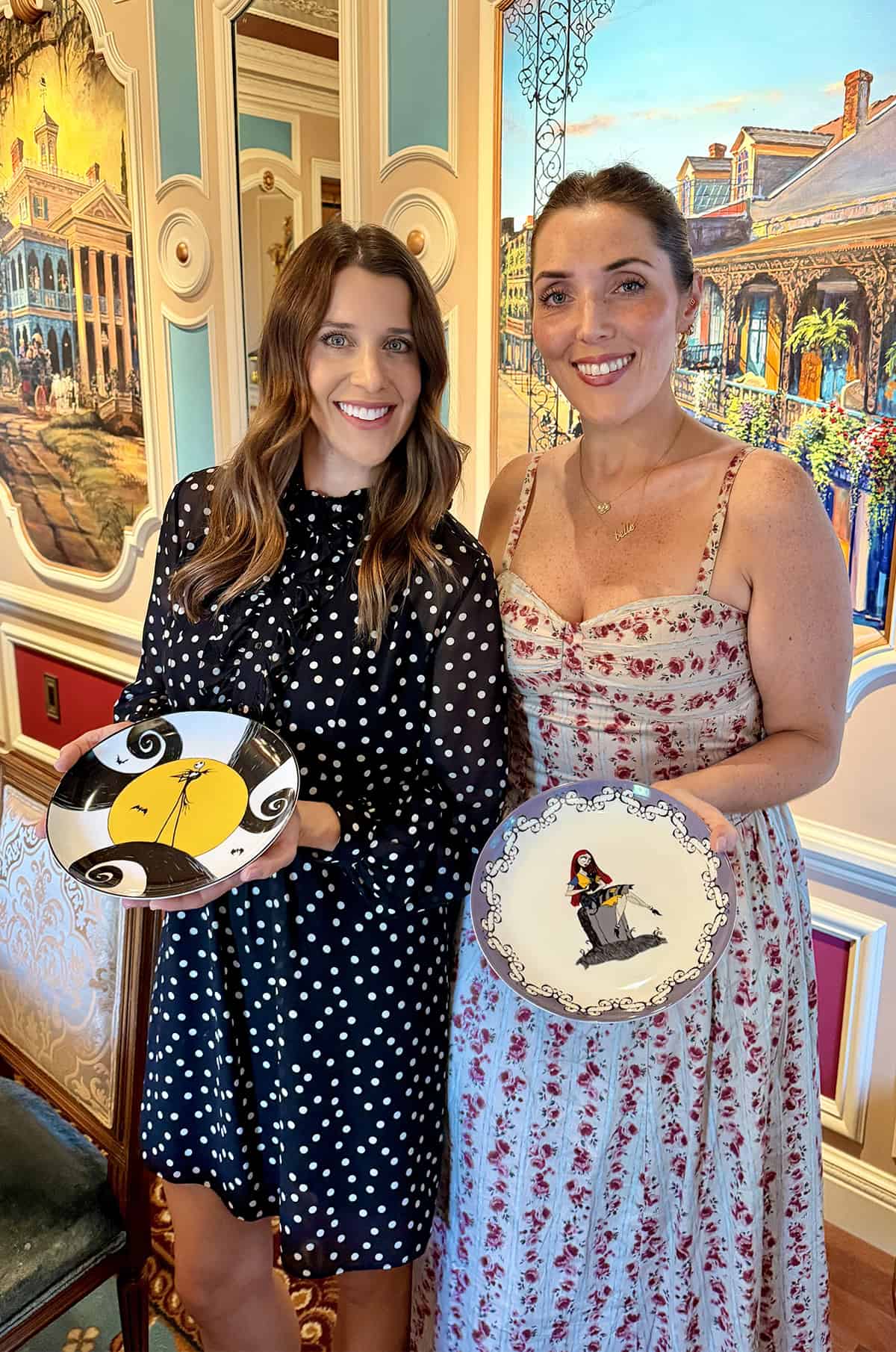 Kelly Senyei with Belle English at 21 Royal holdling Nightmare Before Christmas plates.