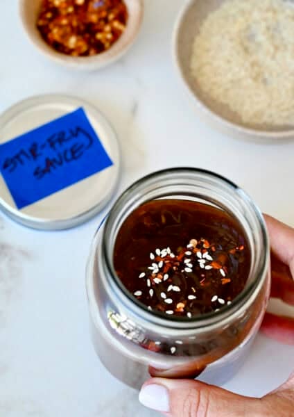 Homemade stir fry sauce in a mason jar.