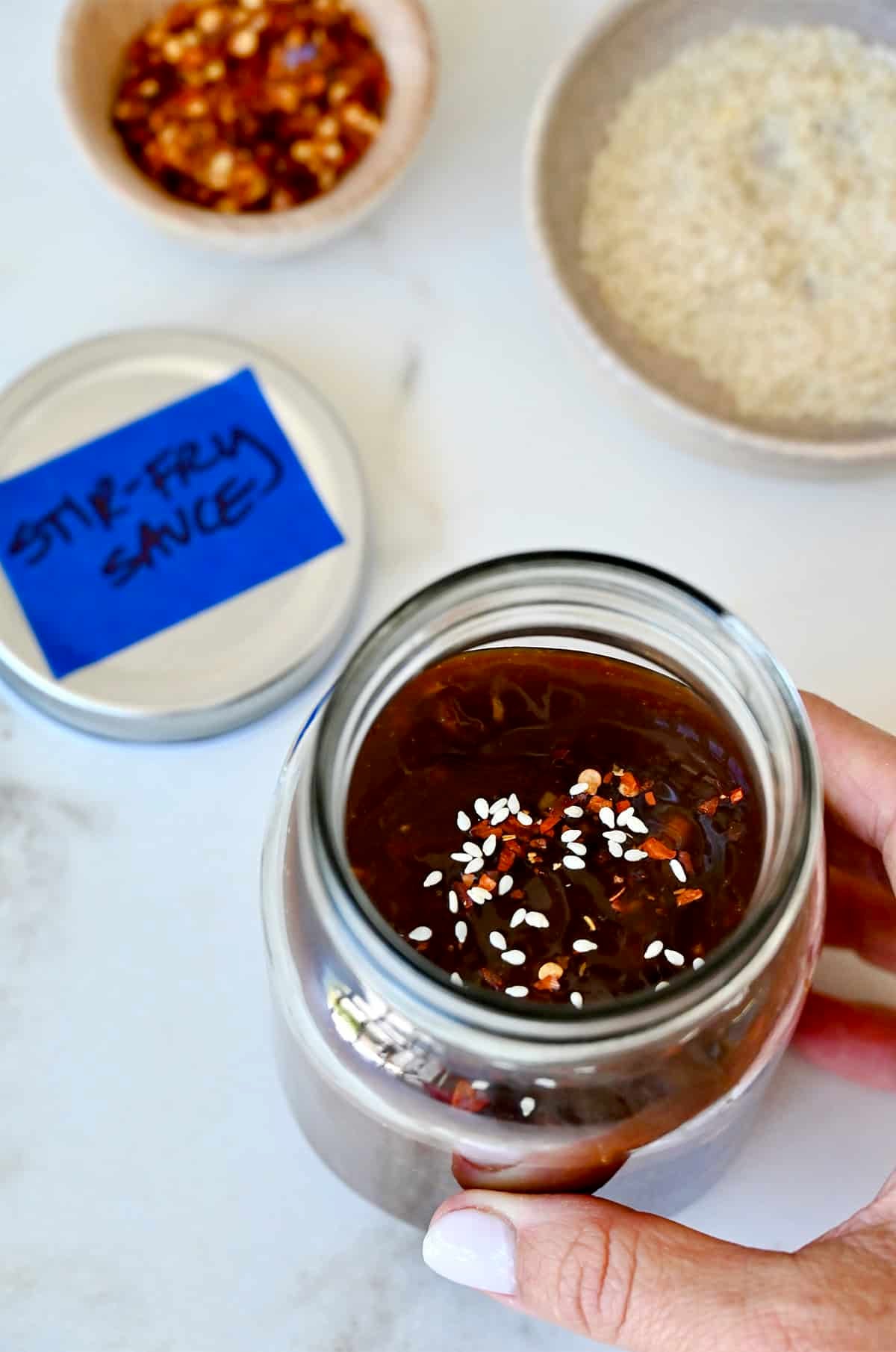 Homemade stir fry sauce in a mason jar.
